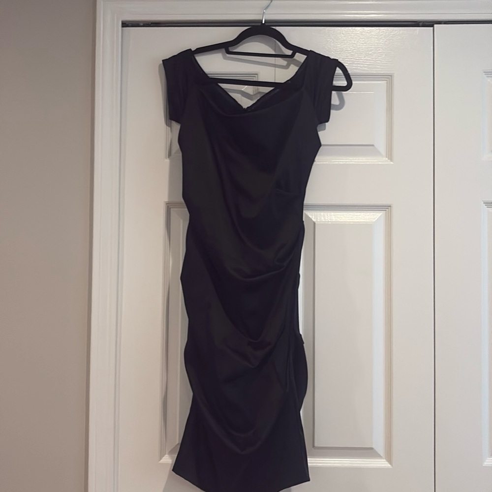 Black dress by designer Nicole Miller collection